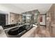 Modern bathroom featuring a large soaking tub, glass shower, and upscale finishes at 3475 Oak Valley Ne Rd # 1720, Atlanta, GA 30326