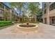 Relaxing community fountain surrounded by elegant landscaping and buildings at 3475 Oak Valley Ne Rd # 1720, Atlanta, GA 30326