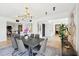 Modern dining room featuring a sleek table, contemporary lighting, and an open-concept design at 3475 Oak Valley Ne Rd # 1720, Atlanta, GA 30326