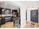 Kitchen with breakfast bar featuring stainless appliances and marble tiled floors at 3475 Oak Valley Ne Rd # 1720, Atlanta, GA 30326