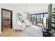 Bright living room featuring neutral tones, modern decor, and floor to ceiling windows at 3475 Oak Valley Ne Rd # 1720, Atlanta, GA 30326
