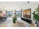 Living room features natural light, hardwood floors, and artistic decor at 3475 Oak Valley Ne Rd # 1720, Atlanta, GA 30326