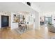 Bright living space featuring a dining table, built-in bar, and hardwood floors at 3475 Oak Valley Ne Rd # 1720, Atlanta, GA 30326
