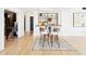 Living area features a built-in bar, hardwood floors, and modern design at 3475 Oak Valley Ne Rd # 1720, Atlanta, GA 30326