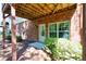 Walkout basement with brick facade, and patio, surrounded by landscaping, providing great backyard access at 3810 Baverton Dr, Suwanee, GA 30024