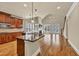 Open kitchen with granite counters, stainless appliances and hardwood floors at 3810 Baverton Dr, Suwanee, GA 30024