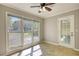 Dining area with large windows and a door leading to the outside at 72 Grayson New Hope Rd, Grayson, GA 30017