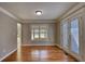 Elegant dining room featuring hardwood flooring and access to the backyard through glass doors at 72 Grayson New Hope Rd, Grayson, GA 30017
