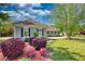 Charming single-story home with manicured lawn, lovely landscaping, and welcoming curb appeal at 72 Grayson New Hope Rd, Grayson, GA 30017