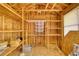 Interior view of outbuilding showcasing exposed framing, shelving, and natural wood construction at 72 Grayson New Hope Rd, Grayson, GA 30017