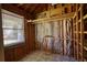 Interior view of unfinished outbuilding showcasing insulation and exposed framing and wood construction at 72 Grayson New Hope Rd, Grayson, GA 30017