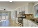 Kitchen featuring stainless steel appliances, gas cooktop, and granite countertops at 72 Grayson New Hope Rd, Grayson, GA 30017