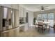 Bright kitchen with stainless steel appliances, a dining area, and a built-in desk at 72 Grayson New Hope Rd, Grayson, GA 30017