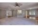 Spacious living area with hardwood floors, carpet, and plenty of natural light at 72 Grayson New Hope Rd, Grayson, GA 30017
