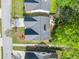 Aerial view of the property showcasing its roof, manicured lawn, patio, and surrounding landscape at 205 E Skyline Vw, Dallas, GA 30157