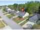 Aerial view of a well-maintained home featuring manicured lawns and mature trees in a quiet neighborhood at 205 E Skyline Vw, Dallas, GA 30157