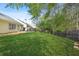 Lush backyard with a spacious lawn and privacy fence, offering a serene outdoor retreat at 205 E Skyline Vw, Dallas, GA 30157