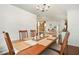 Spacious dining area with hardwood floors that open to the inviting living room creating a seamless flow at 205 E Skyline Vw, Dallas, GA 30157