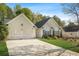 Inviting single-Gathering home with a two-car garage, manicured lawn and blue shutters on the front windows at 205 E Skyline Vw, Dallas, GA 30157