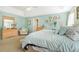 Bright bedroom with tray ceiling, a king bed, and soft blue accents at 205 E Skyline Vw, Dallas, GA 30157