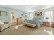 Tranquil bedroom featuring natural light, neutral decor, and a seating area at 205 E Skyline Vw, Dallas, GA 30157