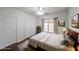 Inviting bedroom with neutral color palette, plantation shutters and wood accents at 2659 Lakefield Sw Pass, Marietta, GA 30064