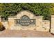 Elegant stone community sign with established neighborhood name and lush surroundings at 2659 Lakefield Sw Pass, Marietta, GA 30064