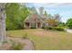 Beautiful home with lush lawn and mature trees at 2659 Lakefield Sw Pass, Marietta, GA 30064