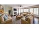 Cozy living room with a fireplace, hardwood floors, and comfortable seating at 2659 Lakefield Sw Pass, Marietta, GA 30064