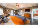 Large main bedroom with ceiling fan, dark hardwood floors, and access to ensuite bathroom at 2659 Lakefield Sw Pass, Marietta, GA 30064