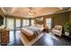 Spacious primary bedroom with tray ceiling and access to private balcony at 2659 Lakefield Sw Pass, Marietta, GA 30064
