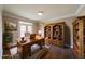 Cozy home office with built-in bookshelves and natural light at 2659 Lakefield Sw Pass, Marietta, GA 30064