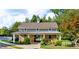 Charming pool house with covered area and lush landscaping at 2659 Lakefield Sw Pass, Marietta, GA 30064