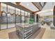 Modern kitchen area featuring granite island, stainless steel appliances and modern lighting at 40 12Th Ne St # 903, Atlanta, GA 30309
