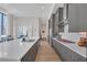 Spacious kitchen featuring modern cabinetry, a large island, and stainless steel appliances at 40 12Th Ne St # 903, Atlanta, GA 30309