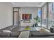Contemporary living room featuring a sleek fireplace and city views at 40 12Th Ne St # 903, Atlanta, GA 30309