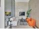 Modern living room featuring stylish furniture and a sleek entertainment center at 40 12Th Ne St # 903, Atlanta, GA 30309