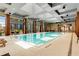 Beautiful indoor pool with city views and ample lounge seating at 40 12Th Ne St # 903, Atlanta, GA 30309
