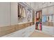 Custom walk-in closet features built-in shelving and ample storage space at 40 12Th Ne St # 903, Atlanta, GA 30309