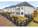 Backyard features manicured flower beds and a dark wooden fence at 501 Blackberry Ln, Canton, GA 30115