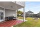 Relaxing outdoor patio with lush backyard space and garden at 501 Blackberry Ln, Canton, GA 30115