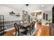 Elegant dining room features a modern chandelier, hardwood floors, and stylish gray and white decor at 501 Blackberry Ln, Canton, GA 30115