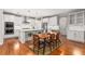 Bright kitchen showcases stainless steel appliances, center island, and a dining area perfect for entertaining at 501 Blackberry Ln, Canton, GA 30115