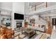 Bright and open living space with a fireplace, high ceilings and seamless flow to the kitchen at 501 Blackberry Ln, Canton, GA 30115