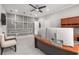 Office features a custom accent wall and a modern desk setup at 501 Blackberry Ln, Canton, GA 30115