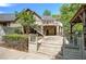 Back exterior of home with deck, stairs, and patio area for outdoor enjoyment at 5894 Highway 20 Ne, Cartersville, GA 30121