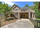 Back exterior view of home with a large deck and covered patio area at 5894 Highway 20 Ne, Cartersville, GA 30121
