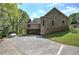 Exterior view of home with ample parking and beautiful lawn space at 5894 Highway 20 Ne, Cartersville, GA 30121