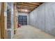 Unfinished basement featuring concrete walls and floors, offering ample potential for customization at 5894 Highway 20 Ne, Cartersville, GA 30121
