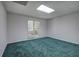 This bedroom is bright with natural light and offers access to other rooms of the home at 5894 Highway 20 Ne, Cartersville, GA 30121